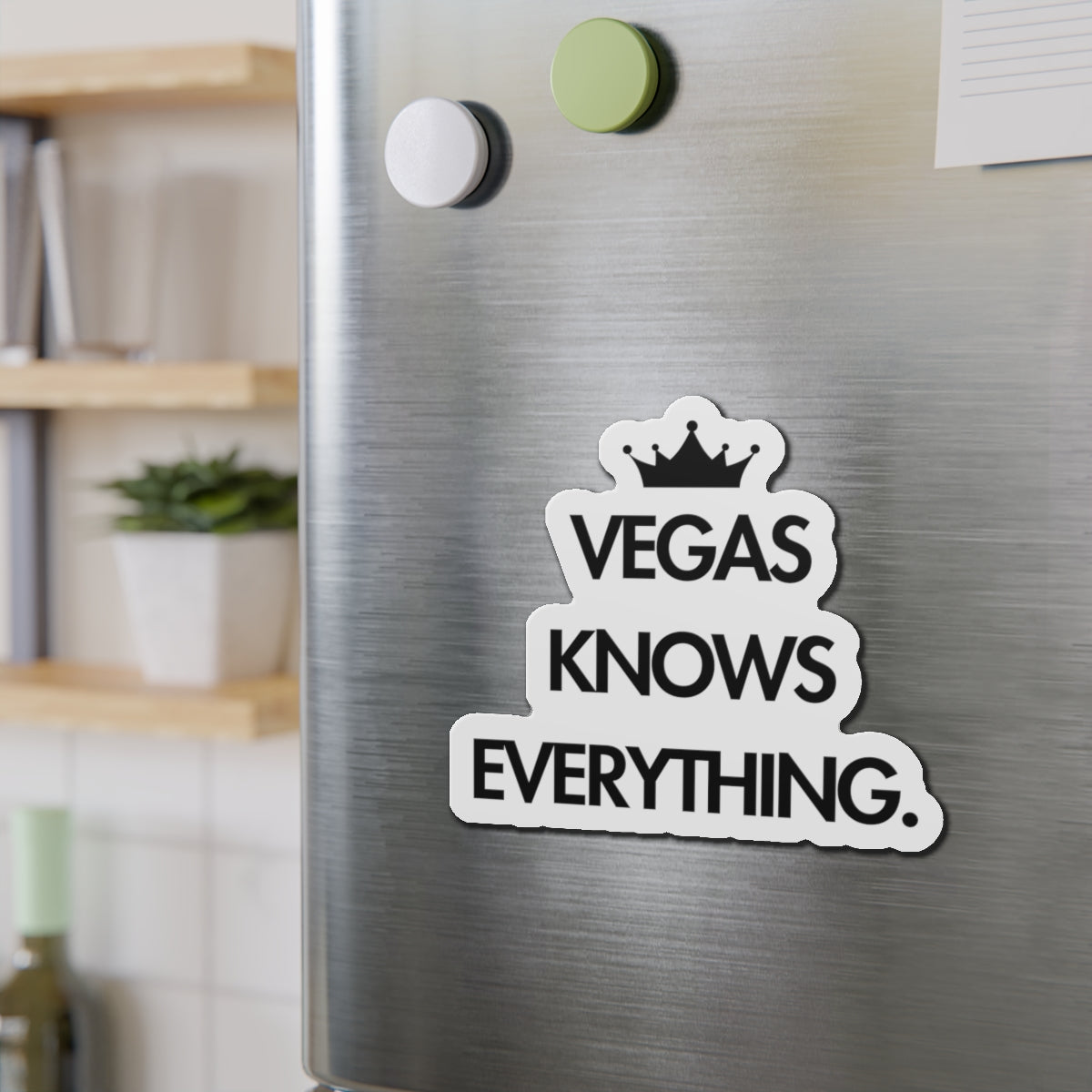 Form Cut Magnet in ascending order, image of a crown, Vegas, Knows, Everything Mock up photo on refrigerator.